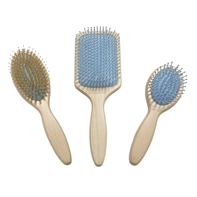 Brosse &agrave; cheveux en bois de h&ecirc;tre blanc avec coussin bleu
