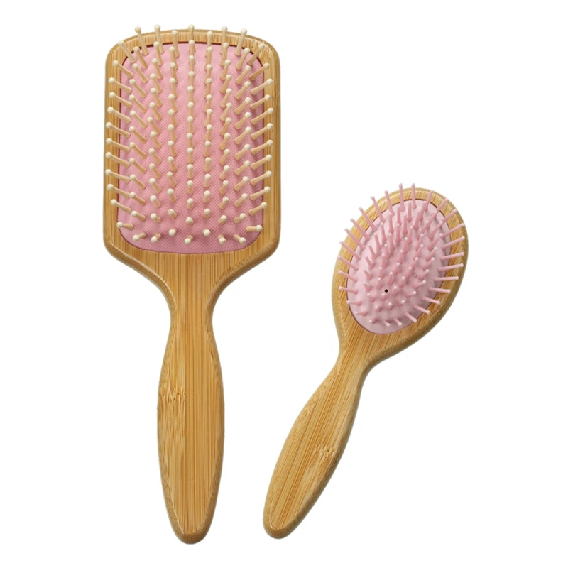 Brosse &agrave; cheveux en bambou FSC, coussin rose avec diff&eacute;rentes broches de massage