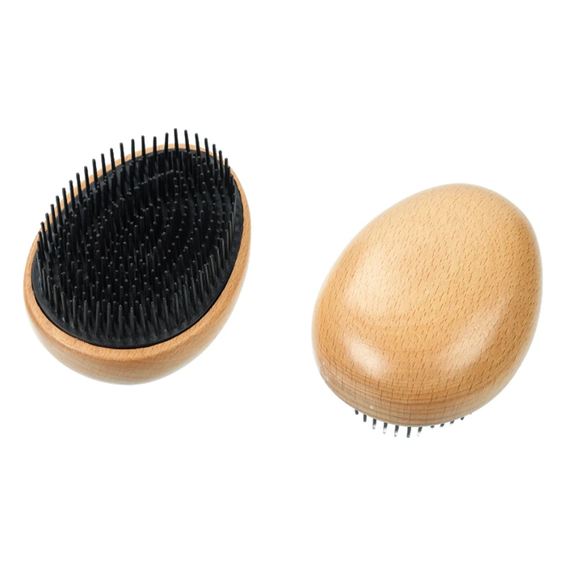 Brosse d&eacute;m&ecirc;lante en bois en forme d'&oelig;uf